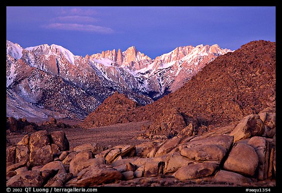 Volcanic boulders in Alabama hills and Mt Whitney, dawn. Sequoia National Park, California, USA.