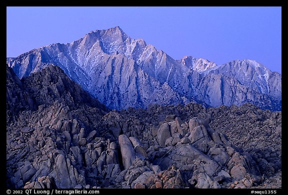 Volcanic boulders in Alabama hills and Lone Pine Peak, dawn. Sequoia National Park, California, USA.