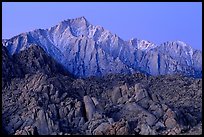 Volcanic boulders in Alabama hills and Lone Pine Peak, dawn. Sequoia National Park, California, USA.