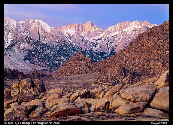 Volcanic boulders in Alabama hills and Mt Whitney, dawn. Sequoia National Park, California, USA.