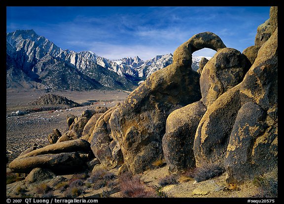 Rock arch and Sierra Nevada range with Mt Whitney, morning. Sequoia National Park, California, USA.