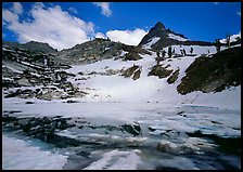 Monarch lake half-frozen in early summer. Sequoia National Park, California, USA.