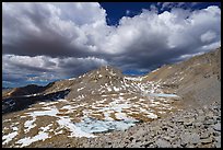 High Sierra landscape with frozen tarns and afternoon clouds. Sequoia National Park ( color)