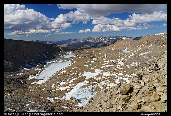 Hikers descend Forester Pass, highest point of Pacific Crest Trail. Sequoia National Park, California, USA.