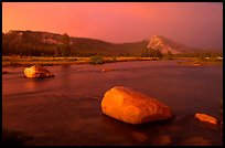 Tuolumne Meadows, Lembert Dome, and rainbow, storm clearing at sunset. Yosemite National Park, California, USA.