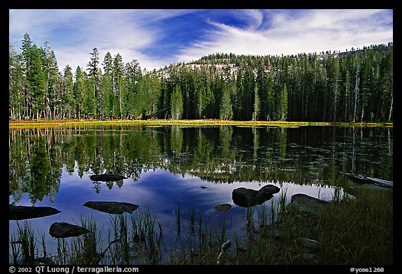 Boulders and reflexions, Siesta Lake, afternoon. Yosemite National Park, California, USA.