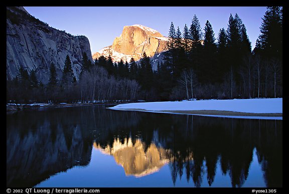 Half-Dome reflected in Merced River near Sentinel Bridge, sunset. Yosemite National Park, California, USA.