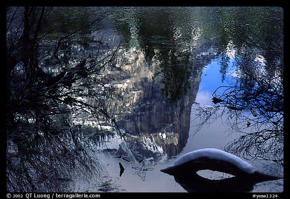 Reflections in Mirror Lake, winter afternoon. Yosemite National Park, California, USA.