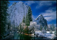 Cathedral rocks and Merced River with fresh snow. Yosemite National Park, California, USA.