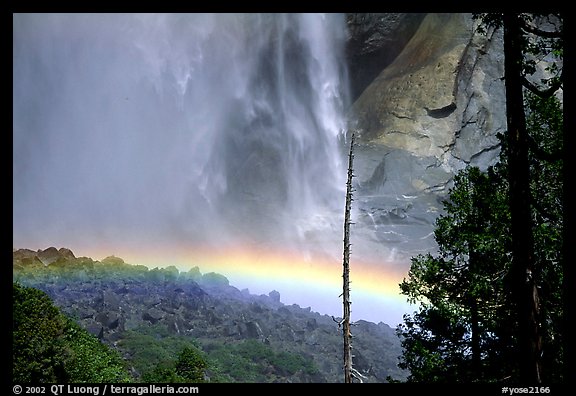 Rainbow at  base of Upper Yosemite Falls. Yosemite National Park, California, USA.