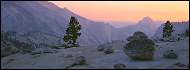 Erratic glacial boulders and Half-Dome at sunset. Yosemite National Park (Panoramic color)