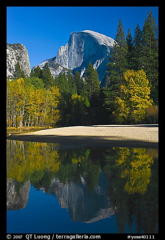 Half Dome reflected in Merced River in the fall. Yosemite National Park, California, USA.