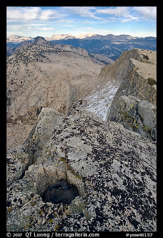 Frozen pot hole and summit cliffs, Mount Hoffman. Yosemite National Park (color)