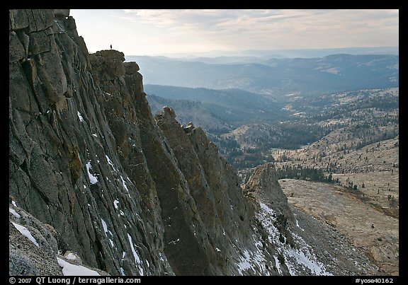 Cliffs on  North Face of Mount Hoffman with hiker standing on top. Yosemite National Park, California, USA.