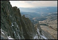 Cliffs on  North Face of Mount Hoffman with hiker standing on top. Yosemite National Park, California, USA.