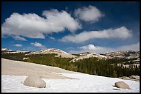 Snow on slab, boulders, and distant domes, Tuolumne Meadows. Yosemite National Park, California, USA. (color)