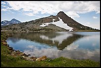 Peak reflected in uppper Gaylor Lake. Yosemite National Park, California, USA.