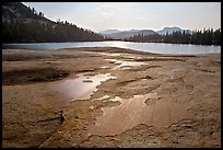 Glacial polish and Lower Cathedral Lake, late afternoon. Yosemite National Park, California, USA.