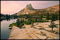 Granite slab, Upper Cathedral Lake, and Cathedral Peak, sunset. Yosemite National Park, California, USA. (color)