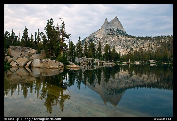 Upper Cathedral Lake and Cathedral Peak at dusk. Yosemite National Park, California, USA.