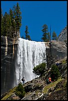 Hikers standing on Mist Trail below Vernal Fall. Yosemite National Park, California, USA.