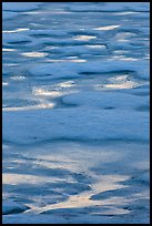 Melting snow pattern on lake. Yosemite National Park, California, USA. (color)