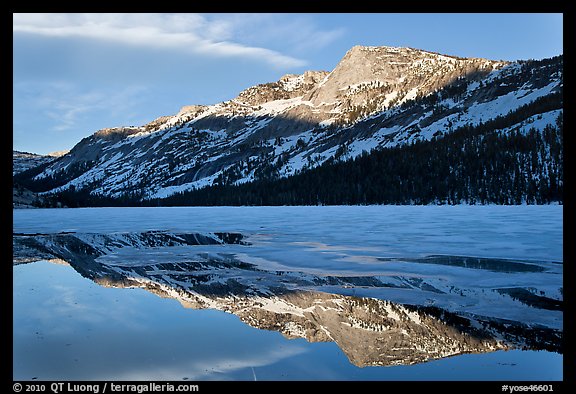 Tenaya Peak reflected in partly iced Tenaya Lake. Yosemite National Park (color)