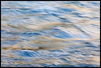 Water reflecting cliff colors. Yosemite National Park, California, USA. (color)