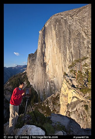 Photographer on Diving Board and Half-Dome. Yosemite National Park, California, USA.