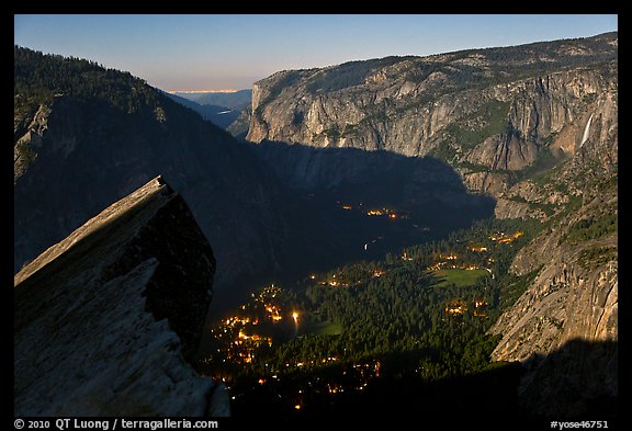 Lights of Yosemite by full moon night. Yosemite National Park, California, USA.