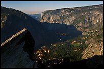 Lights of Yosemite by full moon night. Yosemite National Park, California, USA.