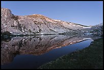 Fletcher Peak reflected in Vogelsang Lake, dusk. Yosemite National Park ( color)