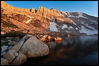 Shore of Upper McCabe Lake with North Peak at sunset. Yosemite National Park, California, USA.