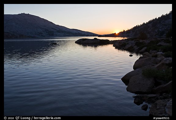 Sun setting over Upper McCabe Lake. Yosemite National Park, California, USA.