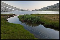 Stream and Roosevelt Lake at sunset. Yosemite National Park, California, USA.