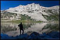 Park visitor looking, Lake Roosevelt. Yosemite National Park, California, USA.