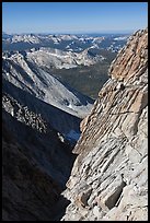 Cliff and distant mountains below the summit of Mount Conness. Yosemite National Park, California, USA.