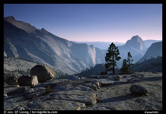 Erratic boulders, pines, Clouds rest and Half-Dome from Olmstedt Point, late afternoon. Yosemite National Park, California, USA.