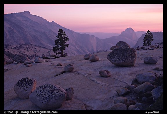 Erratic boulders, pine trees, Clouds rest and Half-Dome from Olmstedt Point, sunset. Yosemite National Park, California, USA.