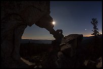 Moon and Indian Arch at night. Yosemite National Park, California, USA.