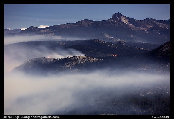 Smoke from fire at night below Clark Range. Yosemite National Park, California, USA.