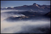 Smoke from fire at night below Clark Range. Yosemite National Park, California, USA.