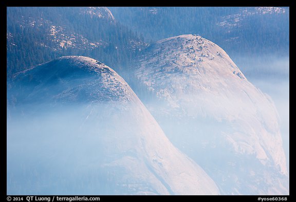 Domes in smoke. Yosemite National Park, California, USA.