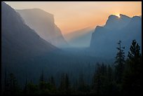 Discovery view with sun rising in notch. Yosemite National Park, California, USA.