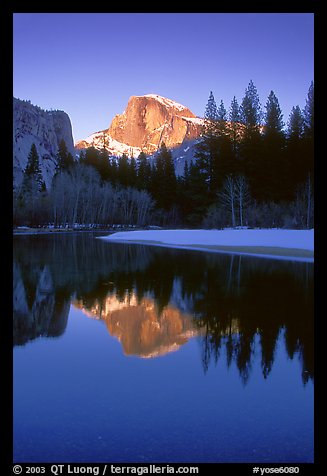 Half-Dome reflected in Merced River, winter sunset. Yosemite National Park, California, USA.