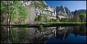 Yosemite Falls reflected in run-off pond. Yosemite National Park, California, USA.