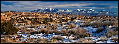 Petrified dunes and mountains in winter. Arches National Park (Panoramic color)