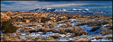 Petrified dunes and mountains in winter. Arches National Park (Panoramic color)
