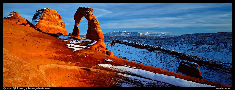 Delicate Arch and snowy mountain. Arches National Park (color)