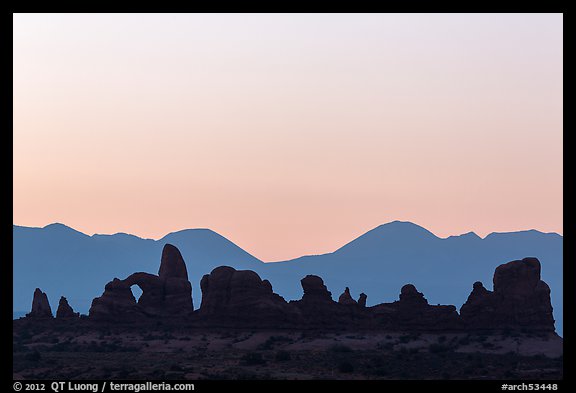 Turret Arch, spires, and mountains at dawn. Arches National Park (color)